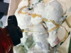 Drizzling honey over Creamy honey-mustard chicken bake with tarragon