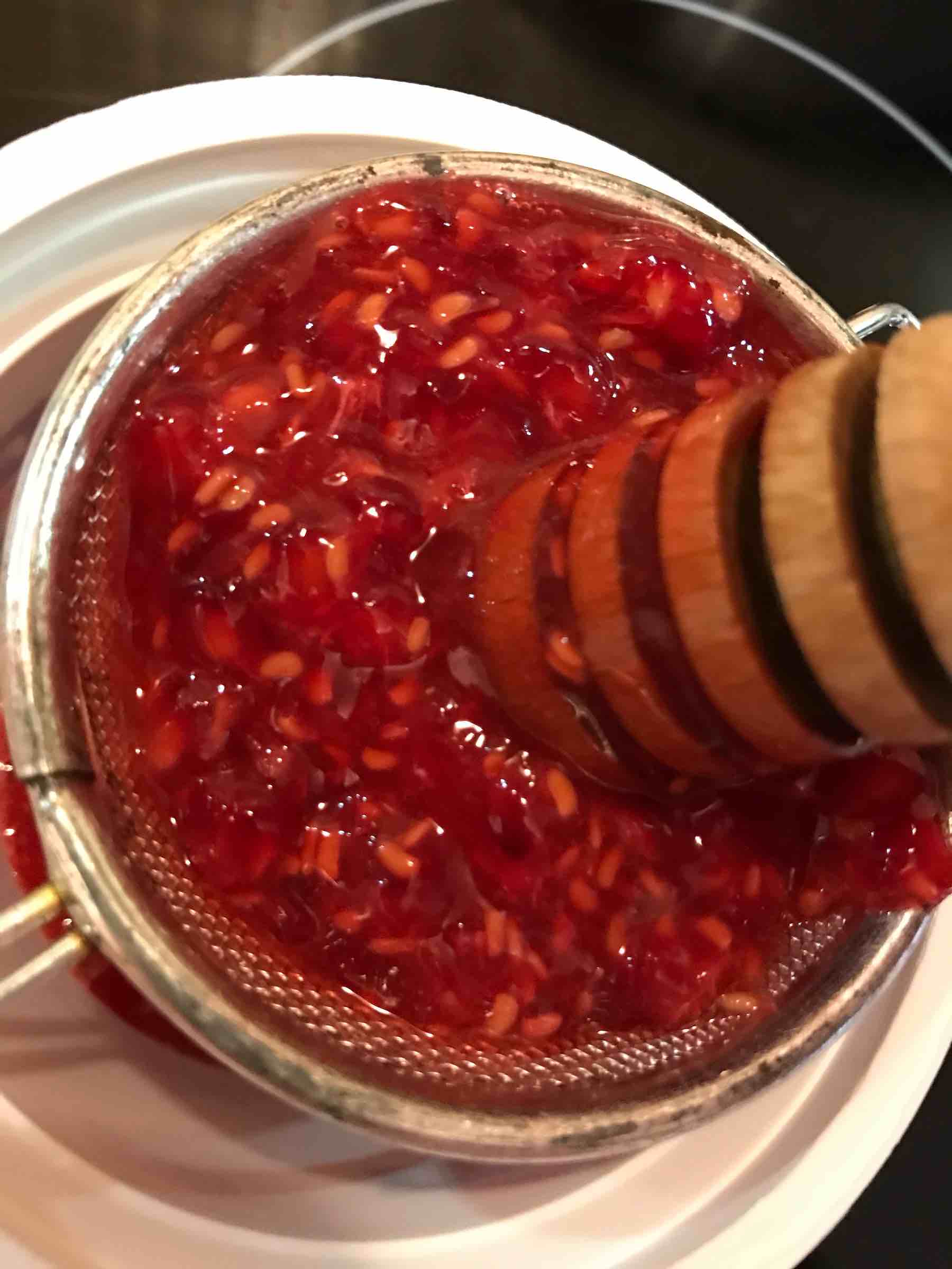 Raspberries being mashed