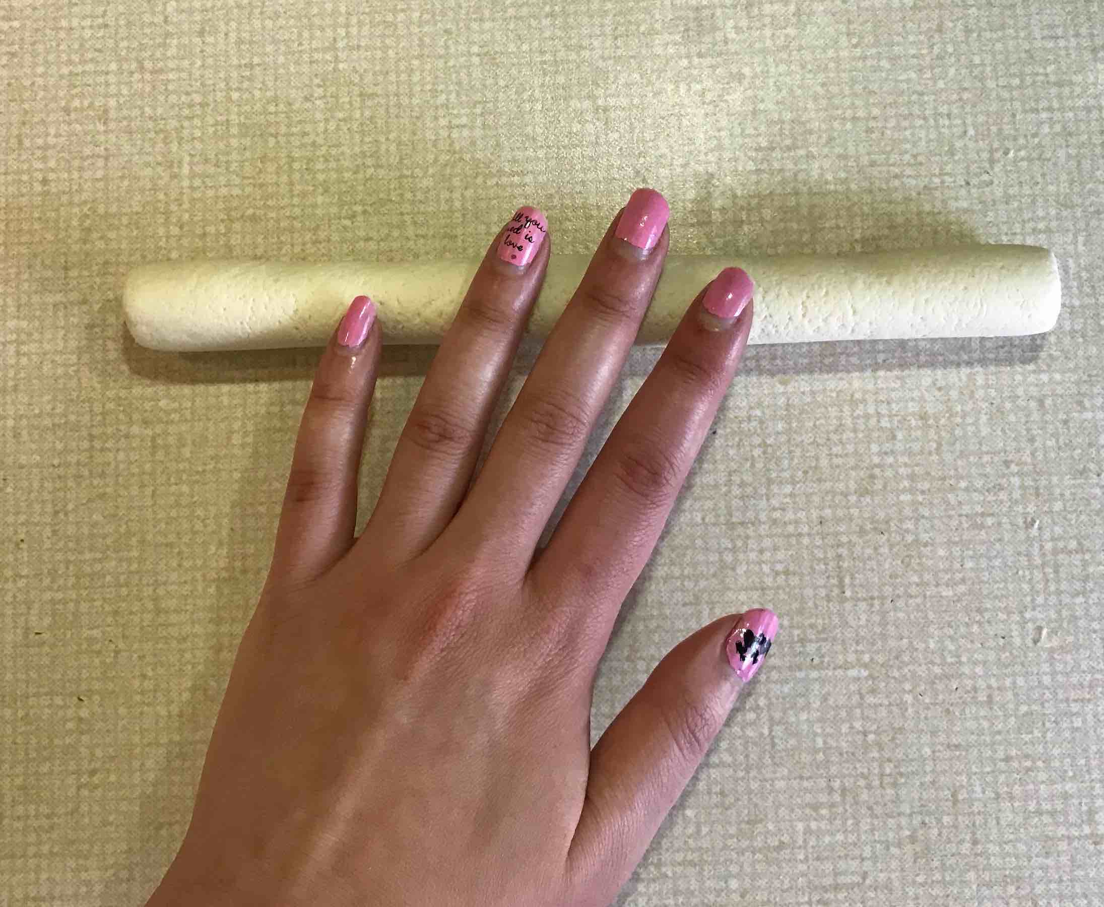 Paneer sausage being rolled