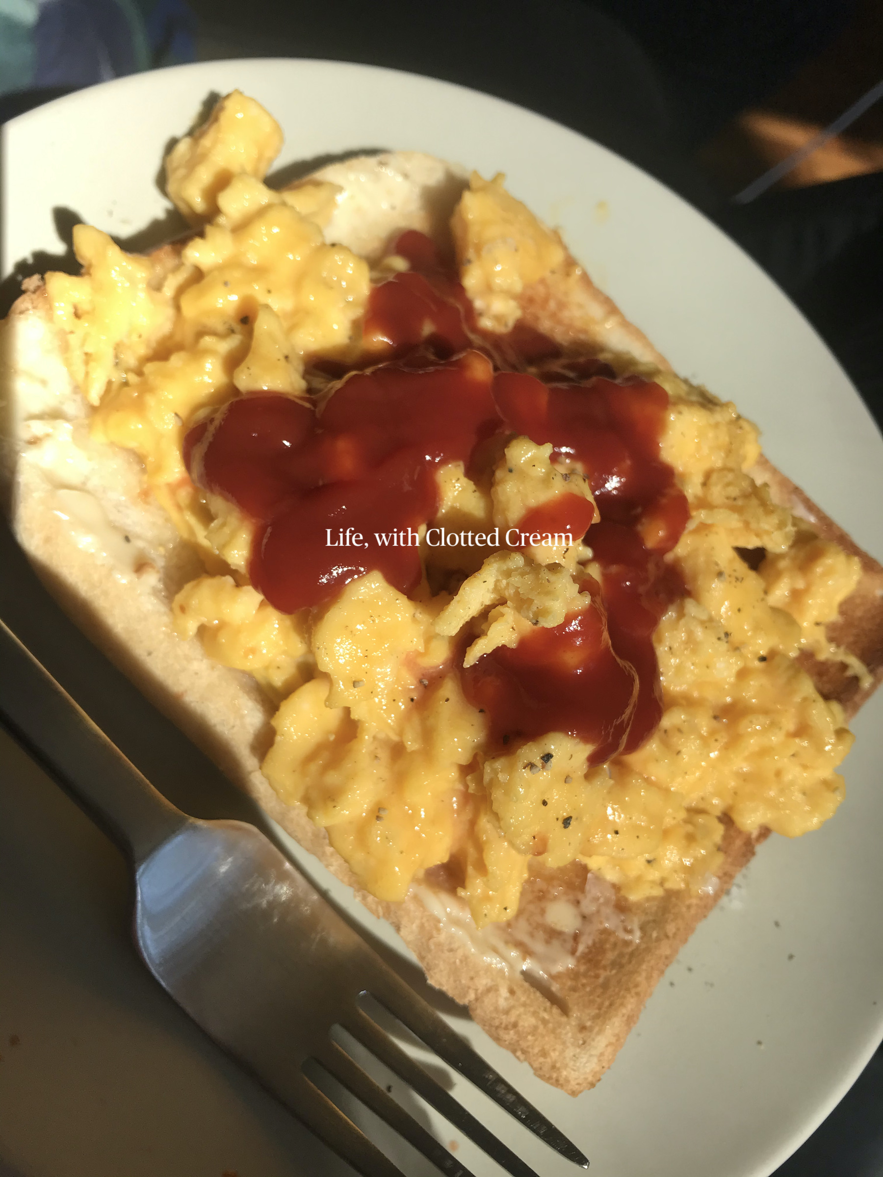 Scrambled eggs with ketchup