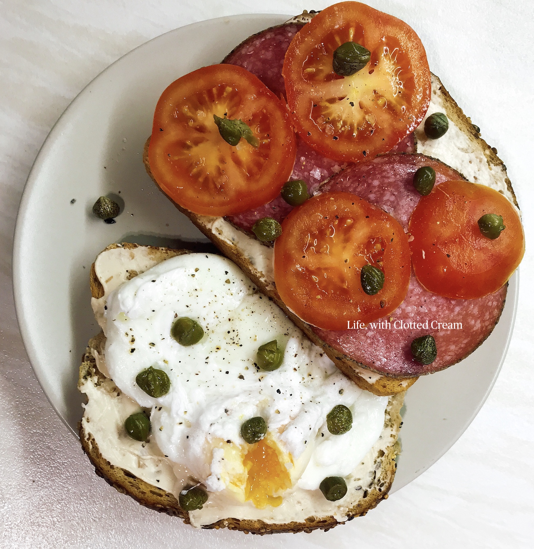 Sandwich with salami tomato and egg