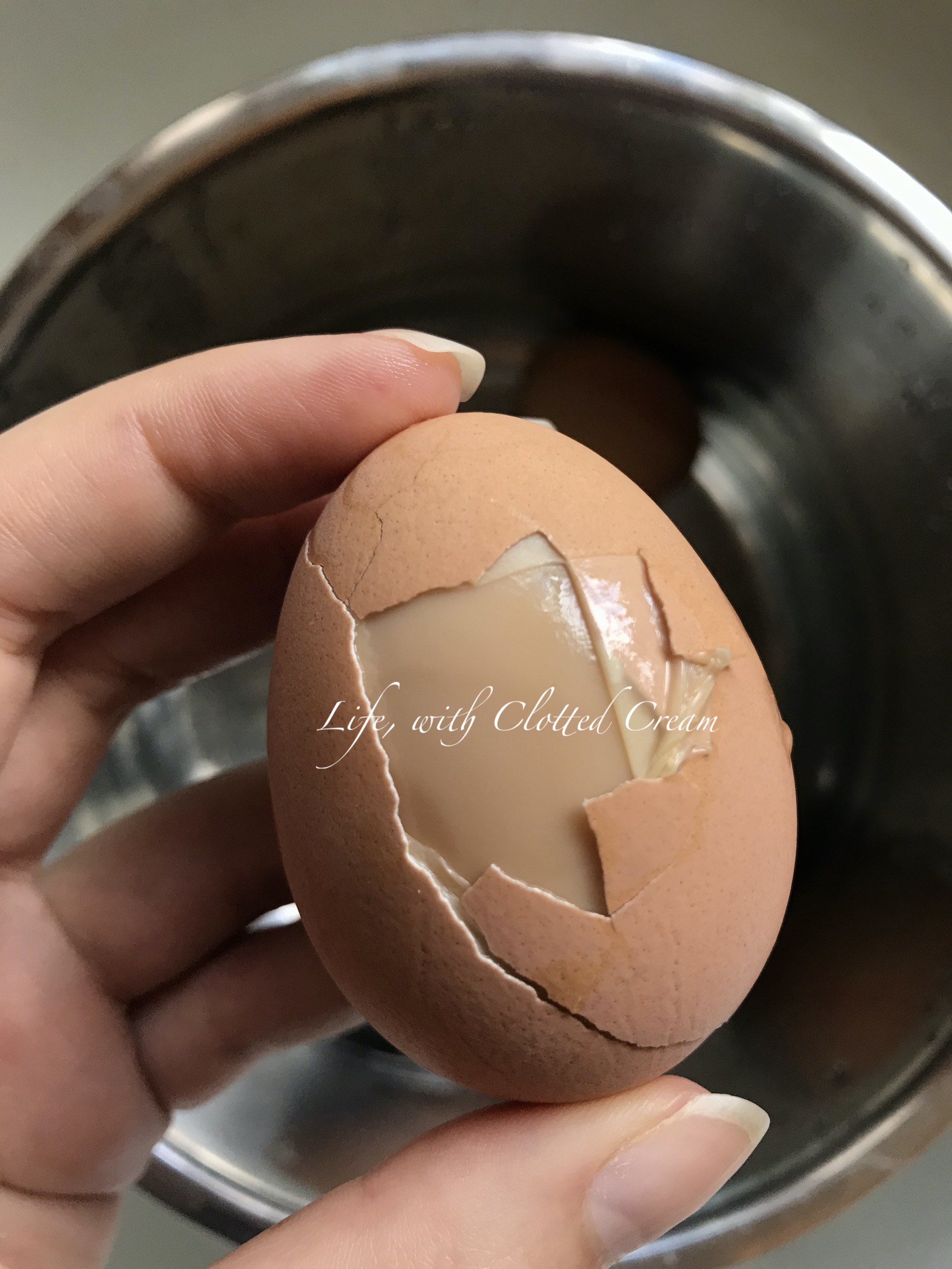 Hardboiled egg half peeled