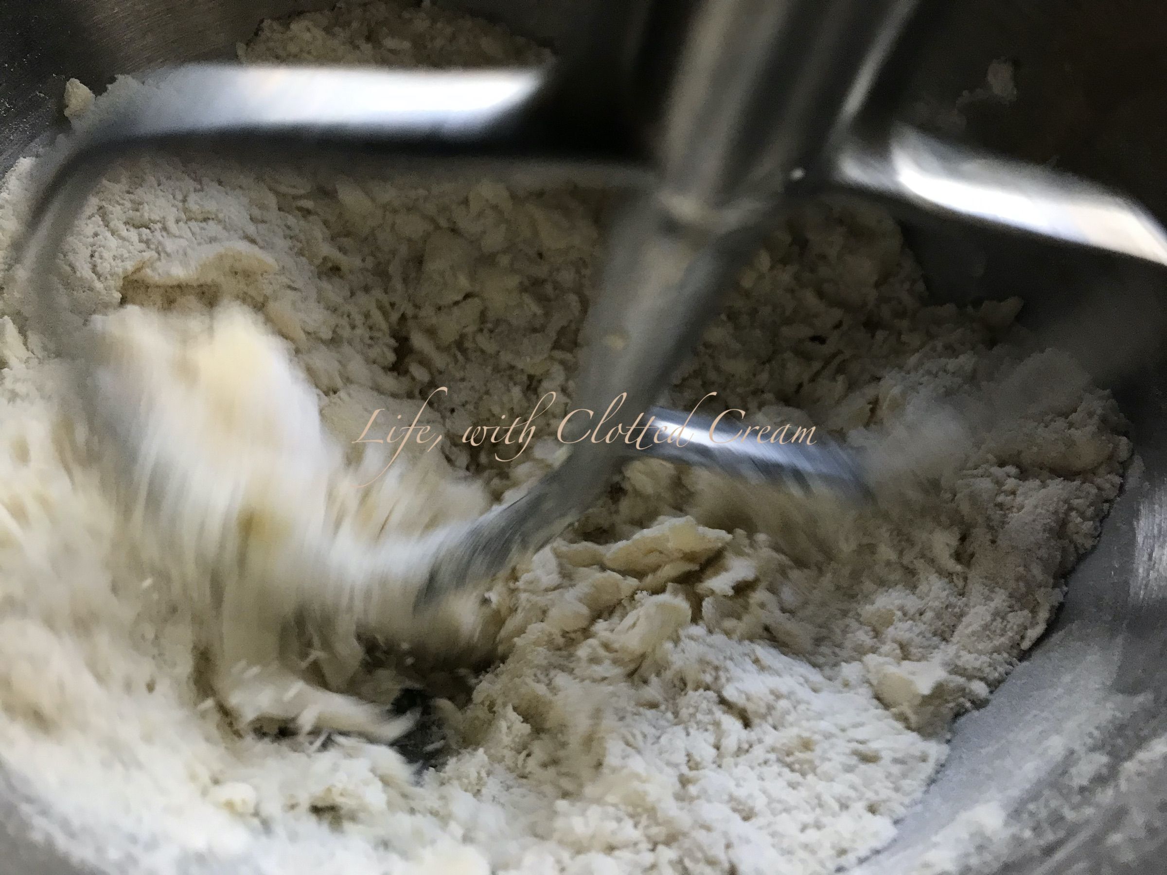 Mixing the flour with butter