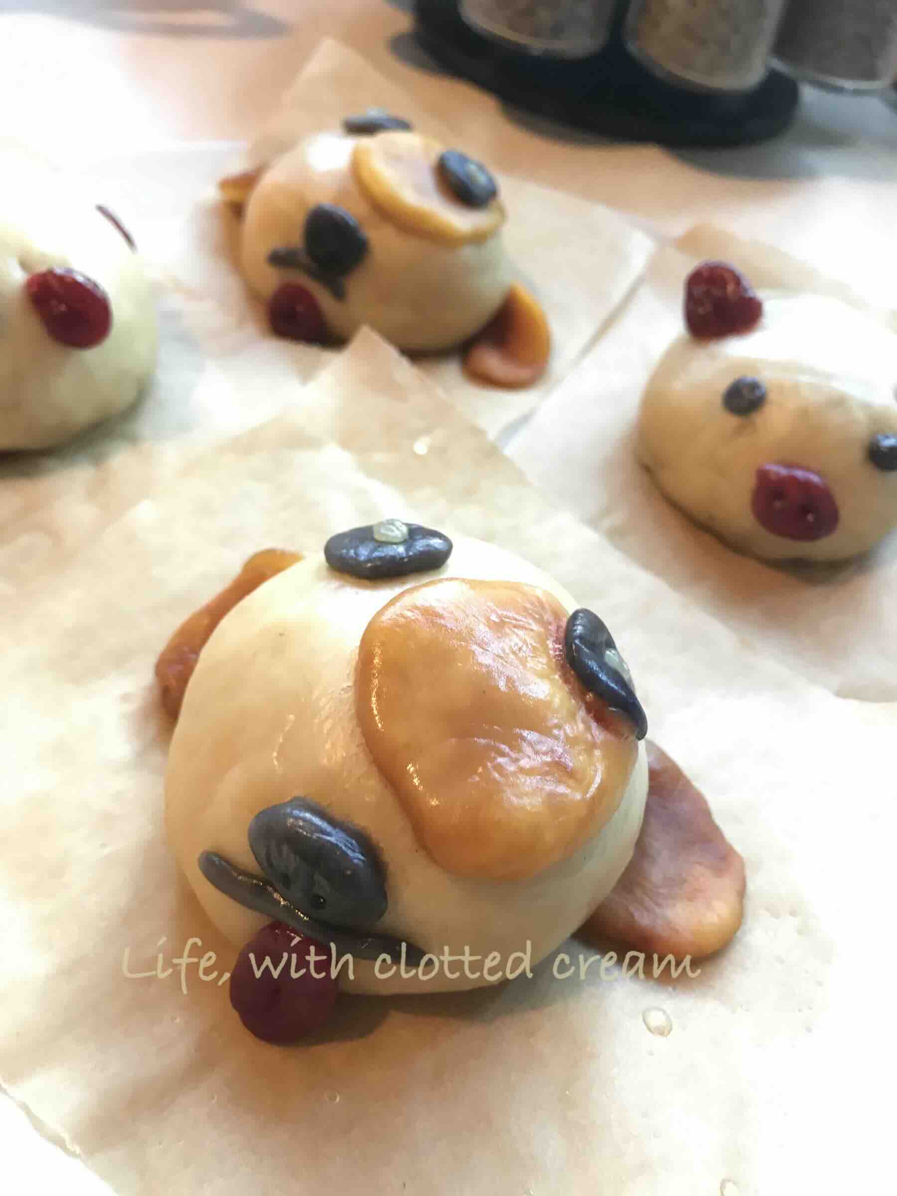 Custard filled bao in the shape of dogs and pigs.