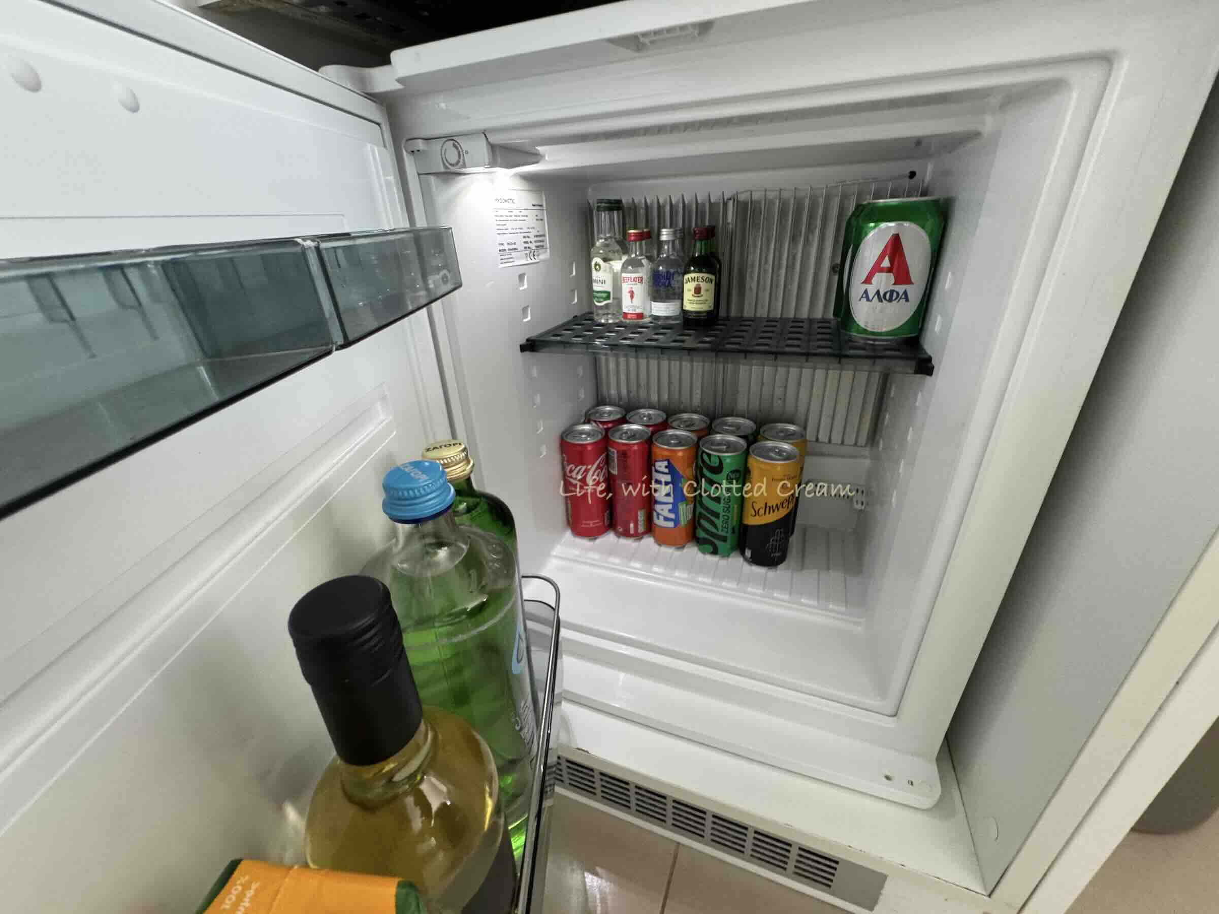 Fully stocked mini bar.
