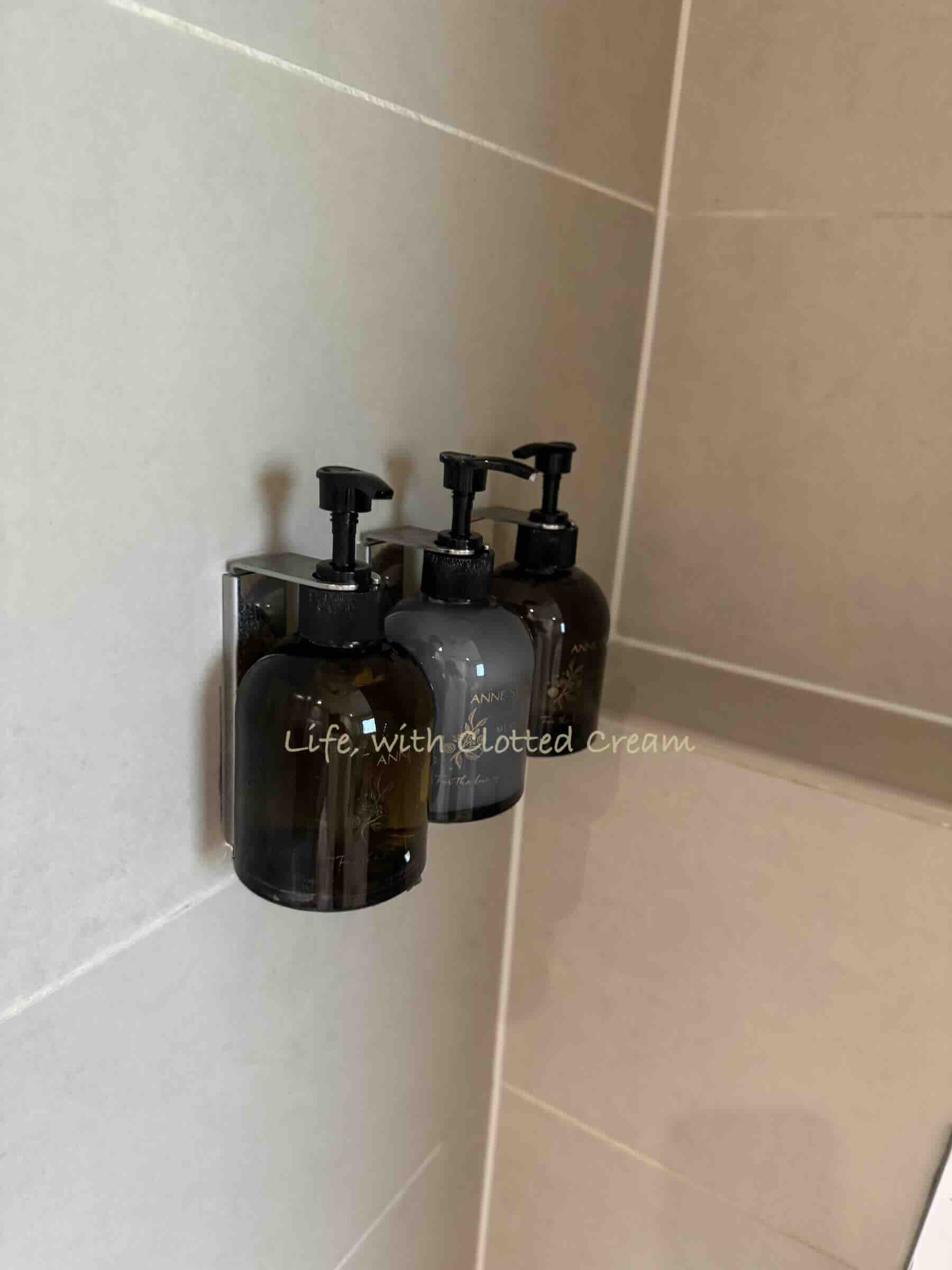 Luxury soap, shampoo and lotion in the bathroom.