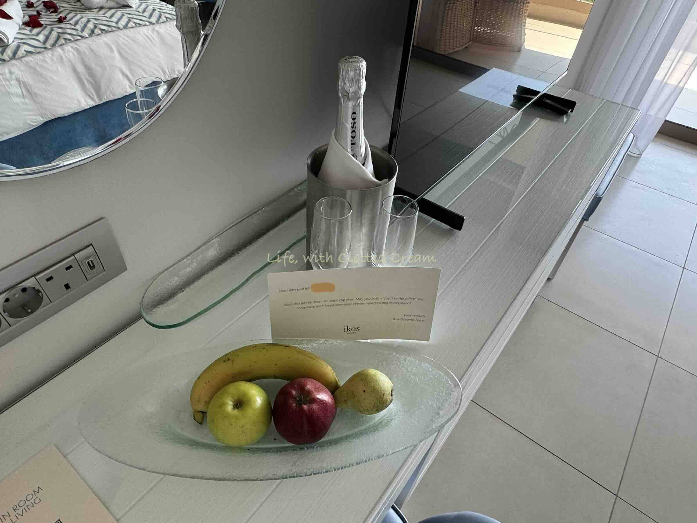 Welcome letter and champagne in our room.